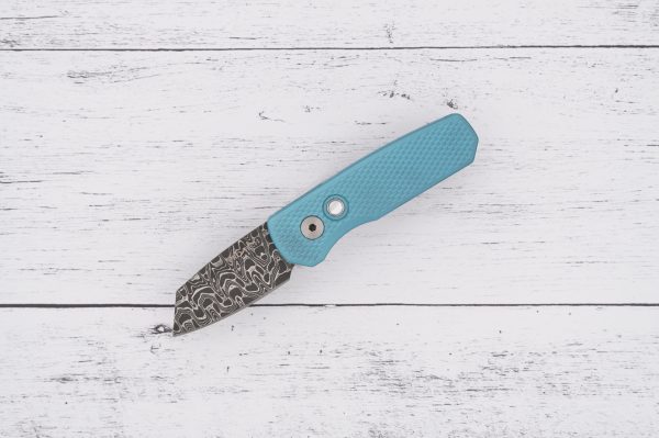 ProTech Runt 5 - Tiff Blue Handles, Damascus Blade, Pearl Button, Satin Hardware and Polished Clip sold by SellYourKnife USA